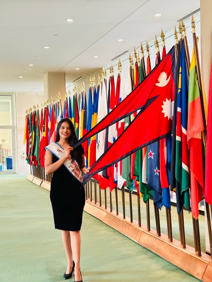 Divya at United Nations with Nepal flag